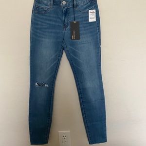 Never worn light ripped skinny jeans high rise